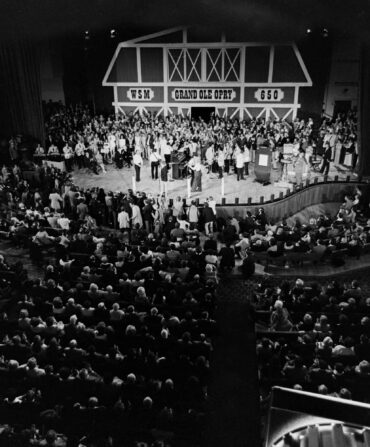 People on stage at the Grand Ole Opry