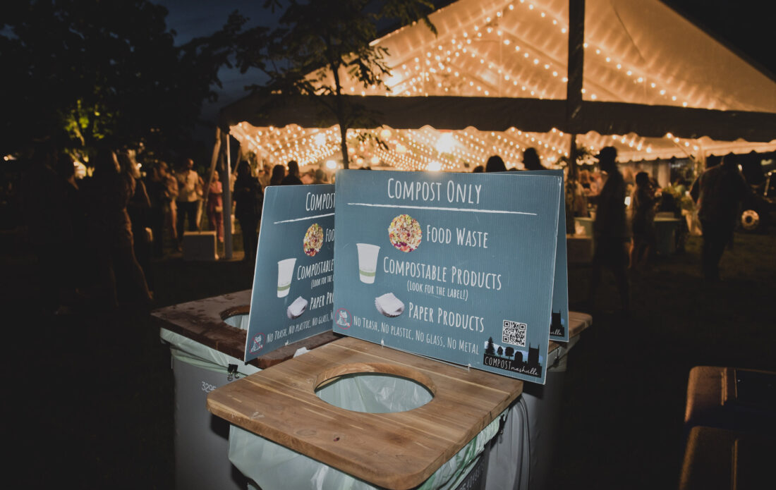 Compost bins outside a wedding tent