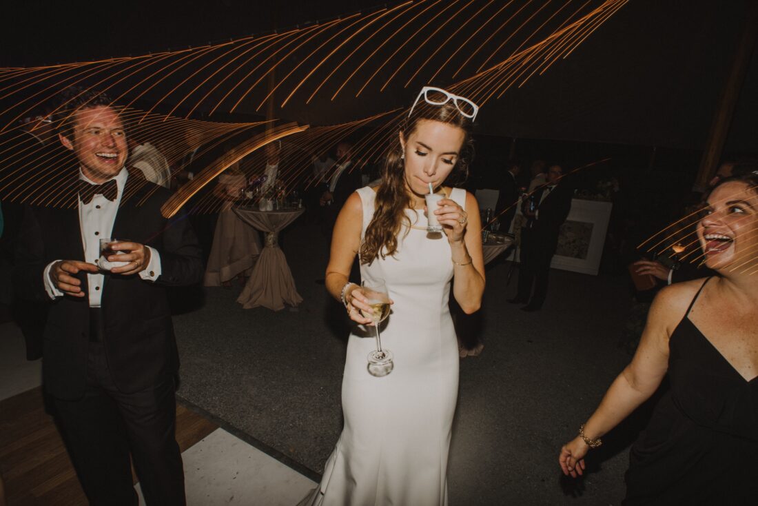 a bride sips a milkshake