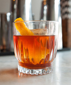 glass of bourbon with ice