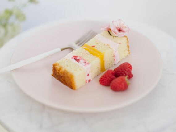 A slice of wedding cake on a plate