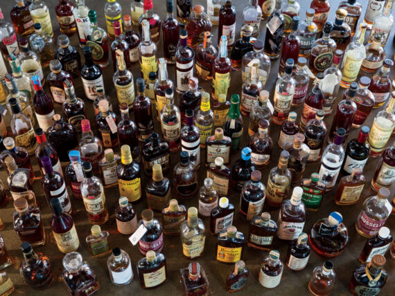 A large number of bourbon bottles