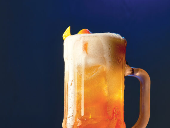 A pitcher of an orange drink